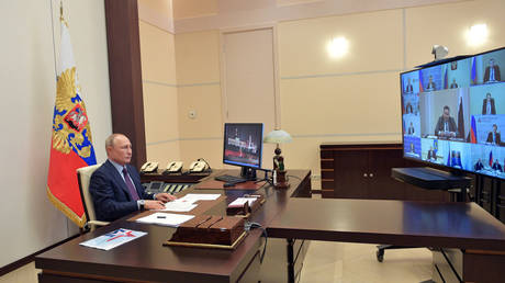 FILE PHOTO. Russian President Vladimir Putin chairs a meeting via a video link.
